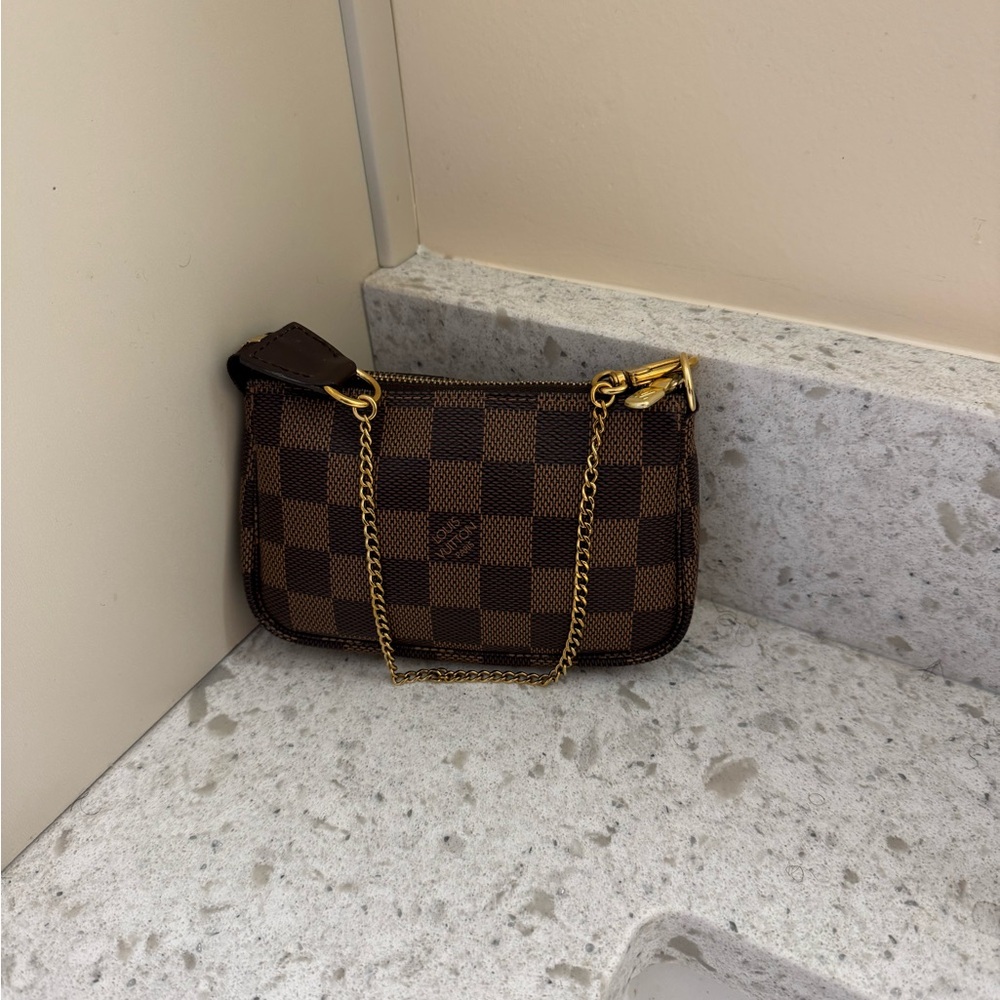 Authentic Louis Vuitton Mini Pochette